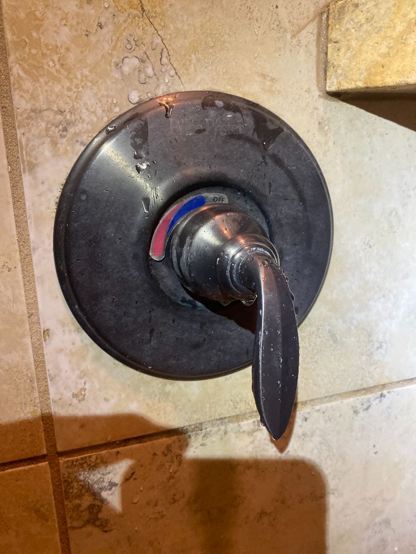 Finished oil-rubbed bronze shower valve installation